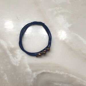 This is a cute blue and gold bracelet I’m new and trying to make money!😊
